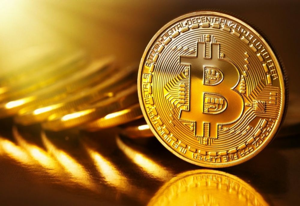 RECORD. BITCOIN A DEPĂȘIT PRAGUL DE 124.000 DE DOLARI
