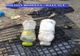  FOTO| Cocaină ascunsă în sticle de plastic în rezervorul unei maşini 